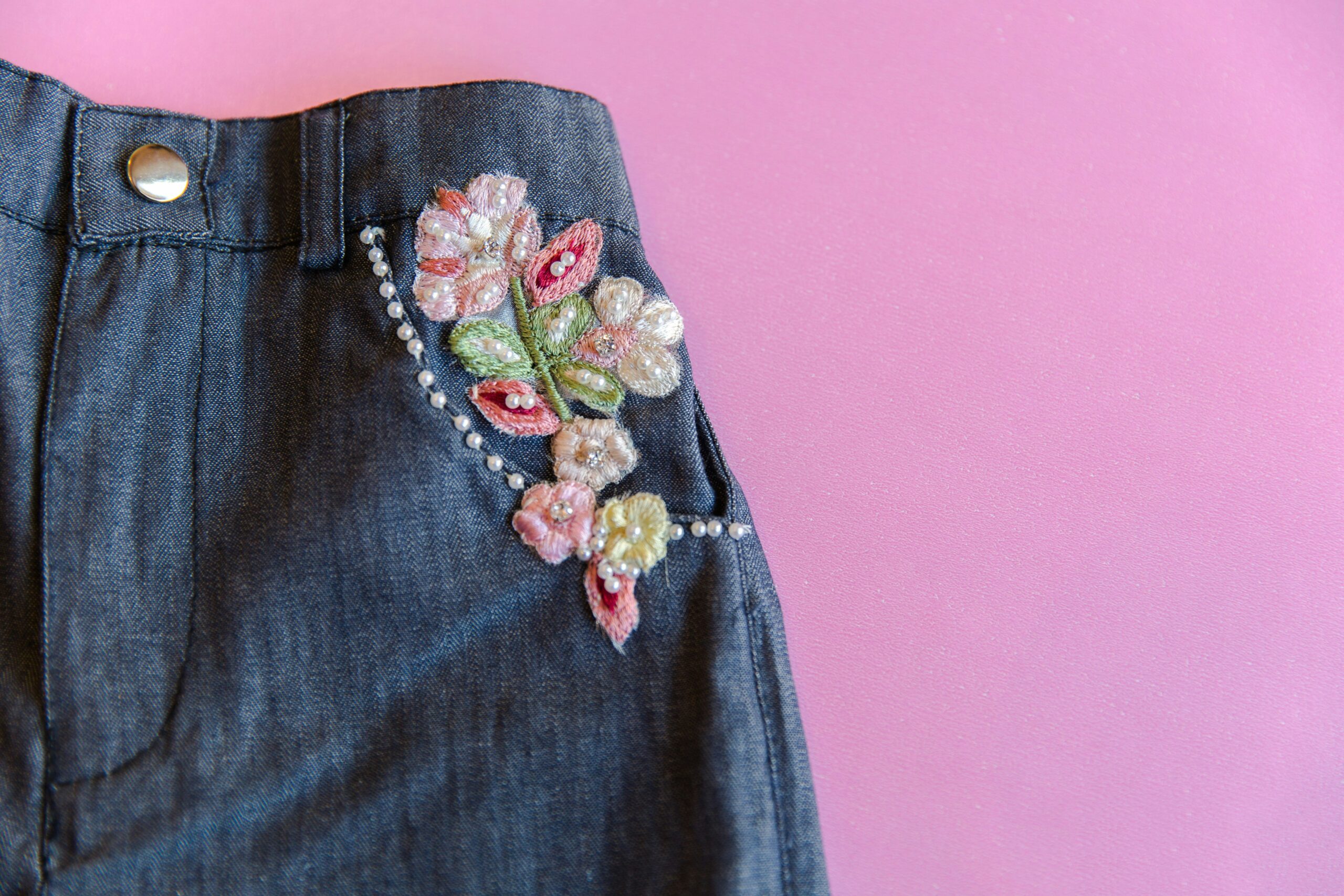 a black jacket with flowers on it